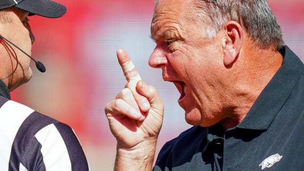 Razorbacks coach Sam Pittman on sidelines working official against Crimson Tide